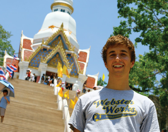 Webster student outside of an Asian temple