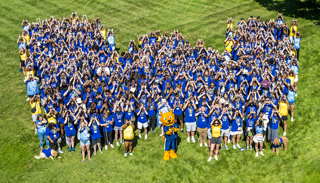 Webster students in a W formation on campus