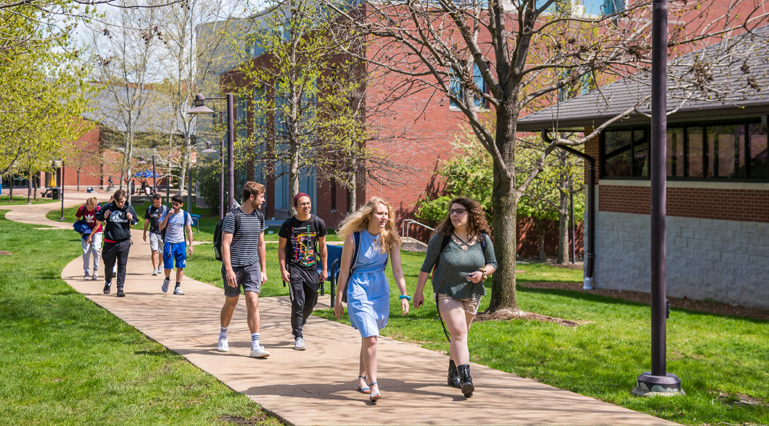 Students walking on Webster campus