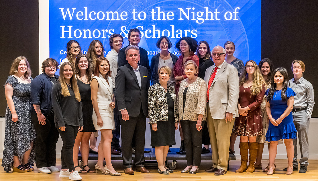 group of honor students and scholarship recipients with Webster administration