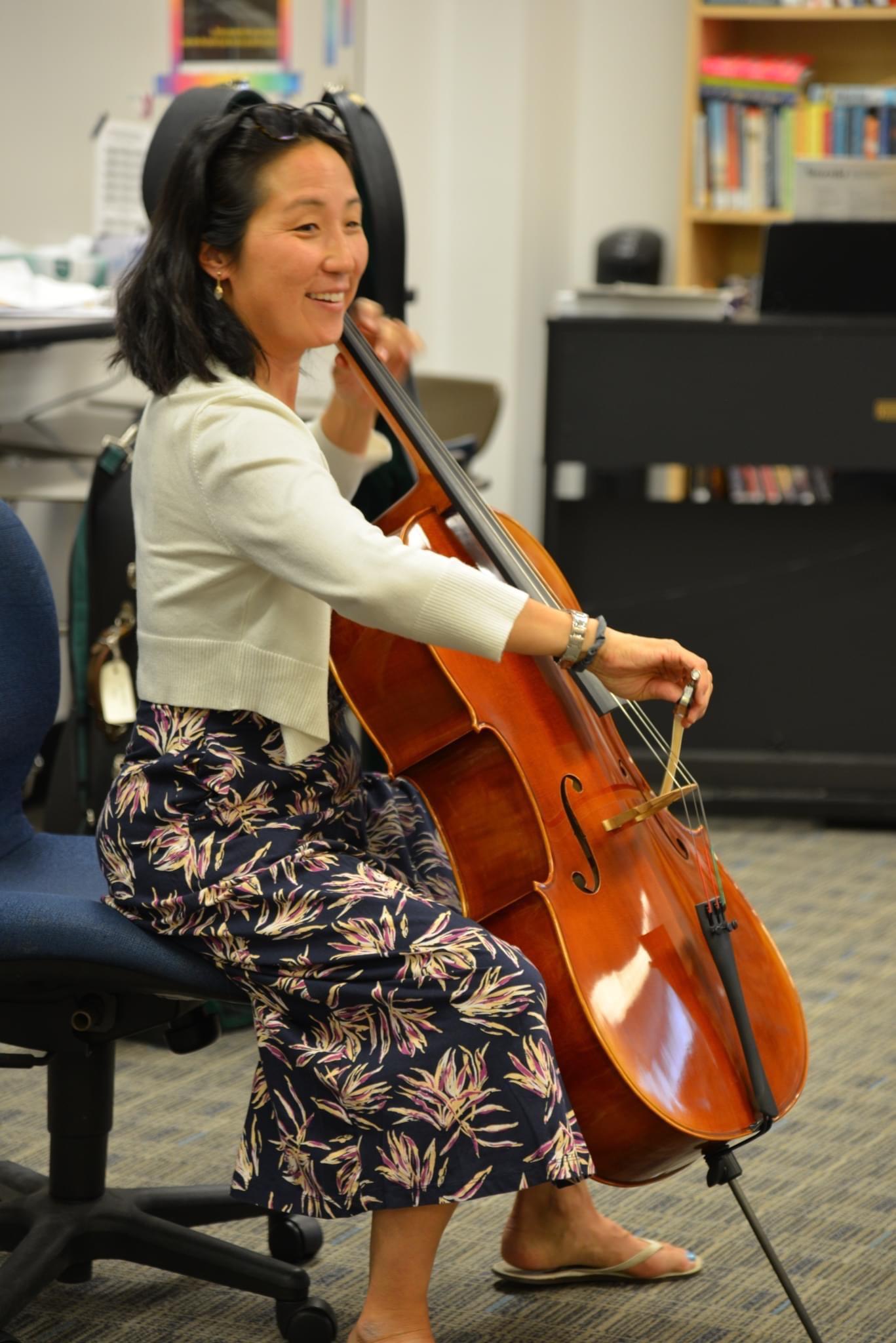 Asian woman playing cello