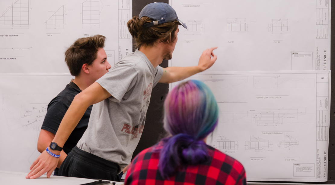 Webster students look over stage layout plan