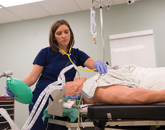 One female student in class with simulated patient